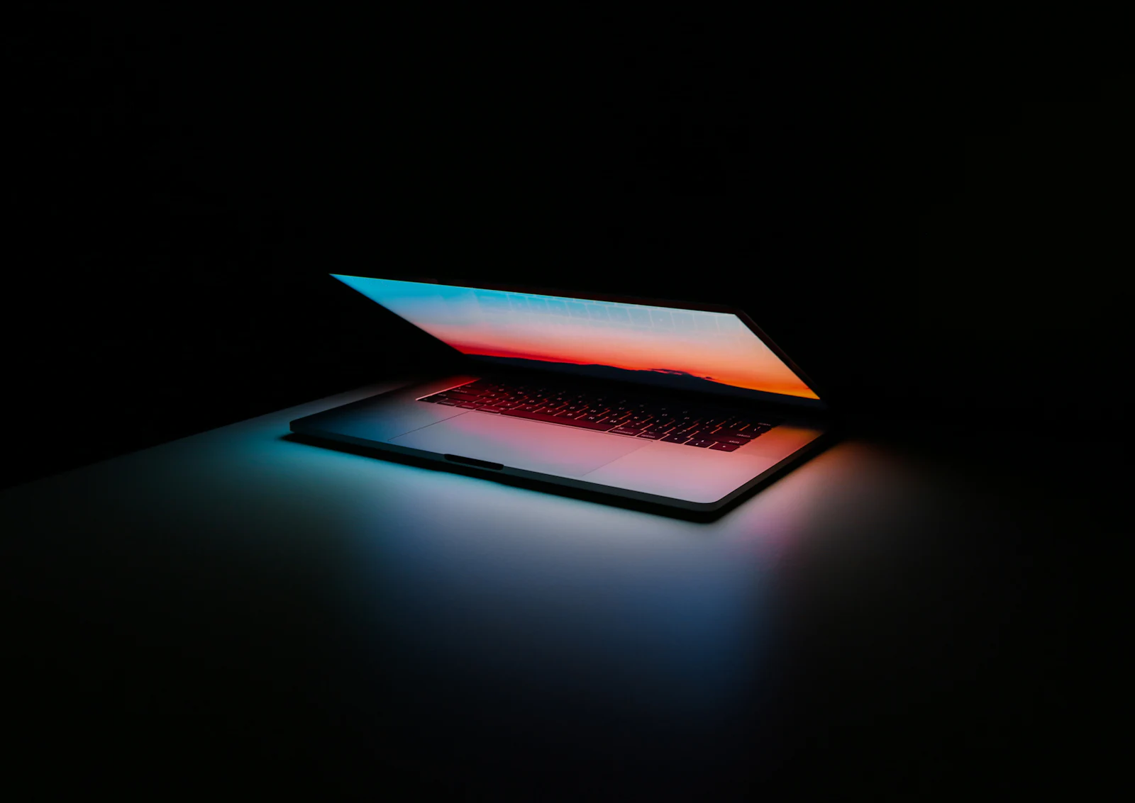 Laptop on a home desk set up for secure remote work